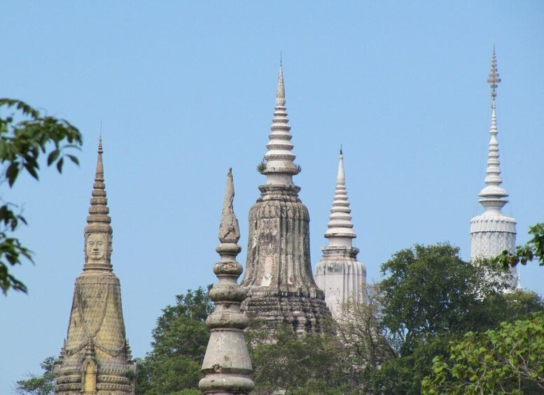 From Phnom Penh: Oudong Stupas & Silver Smith Village