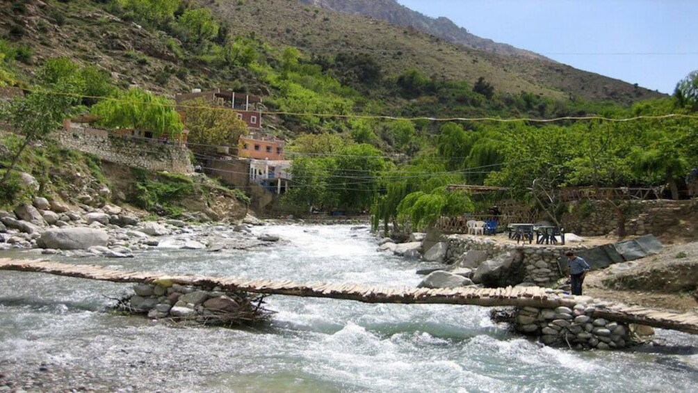 Foot bridge spanning across river in 3 Valleys