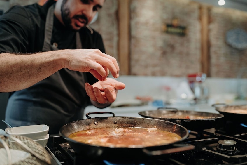 Paella and Tapas Cooking Class in Madrid with Market Visit