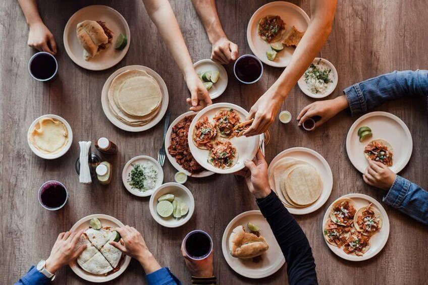 Tour includes tacos, aguas frescas, and shared sides