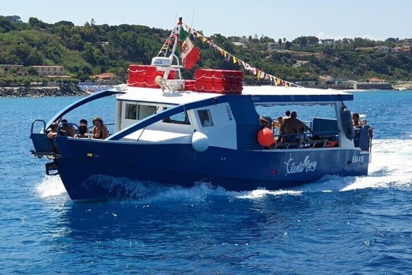 Capitan Paolo's boat riding along the Coast of Gods