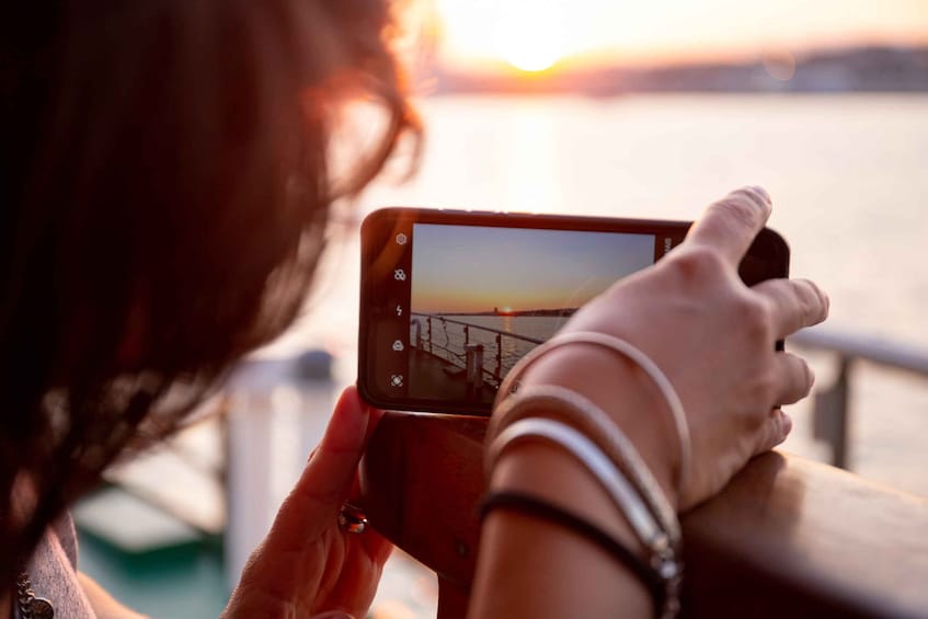 Picture 1 for Activity Lisbon: Tagus River Sunset Tour with Snacks and Drink