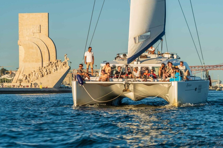 Lisbon: Sunset Catamaran Cruise with Welcome Drink