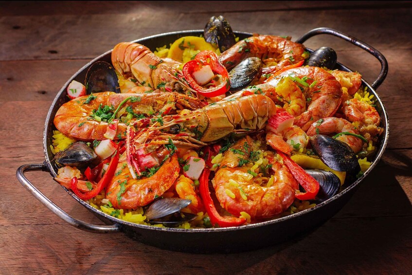 Tapas Tour Paella and Malaga market with Official Guide