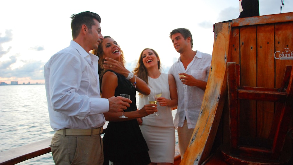 A group of people on a sailboat in Mexico