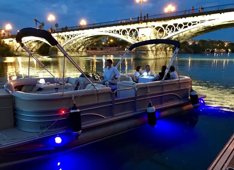 Seville: Private River Cruise with Dinner and Drinks