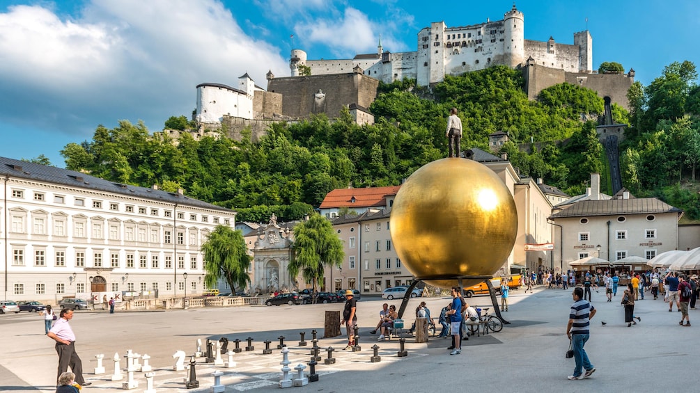 Show item 4 of 5. Gold ball sculpture in Salzburg