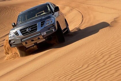 Private Desert Safari with Camel Ride and BBQ dinner in Bedouin Camp