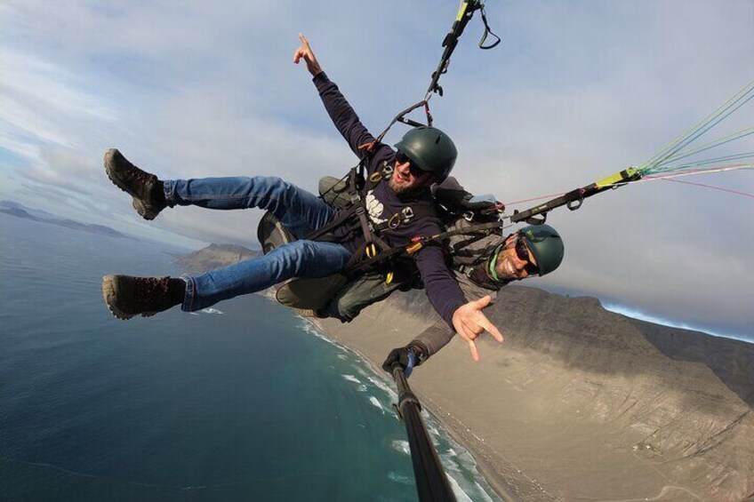 Two-seater paraglider on Famara beach