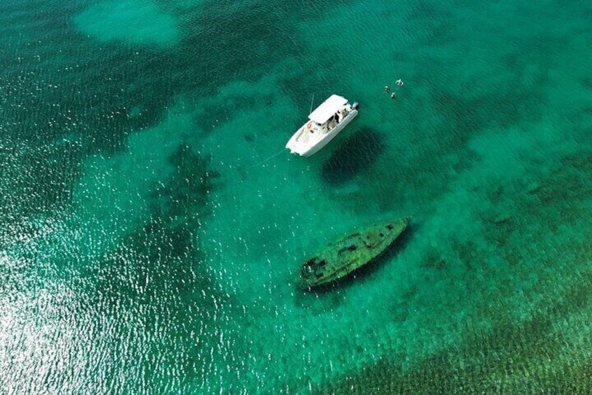 Snorkel a wreck in Christmas Cove