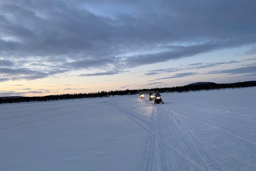 Guided Snowmobile Tour in Kiruna