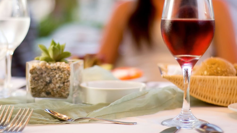 Dining table with wine and food on the Winelands Full-Day Tour in Cape Town, South Africa 