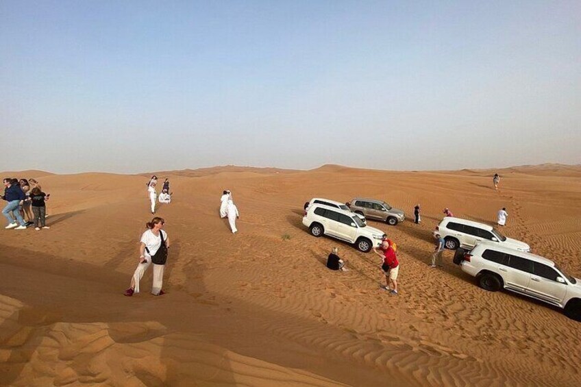 Desert Safari Tour with Camel Ride BBQ Dinner and Sand Boarding 