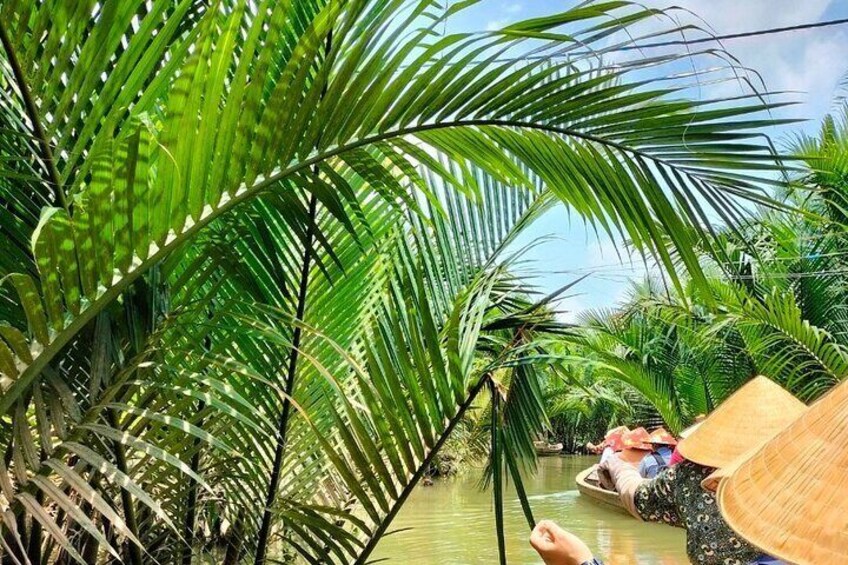 Crawl and Paddle Full day Cu Chi Tunnels and MeKong Delta 