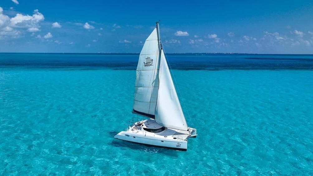 Isla Mujeres Day Tour with Catamaran, Snorkeling & Beach Club
