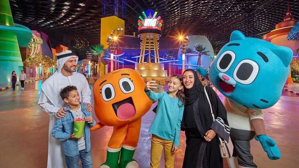 Family with large costume characters in IMG Worlds of Adventure