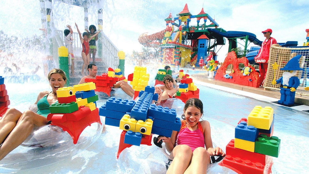 People on inflatable rings on ride at Legoland Dubai