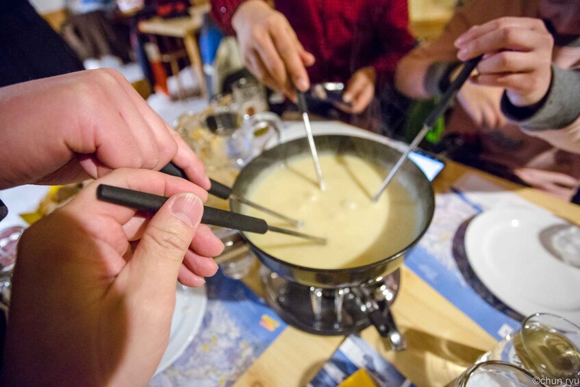 Picture 7 for Activity From Interlaken: Night Sledding with Cheese Fondue Dinner