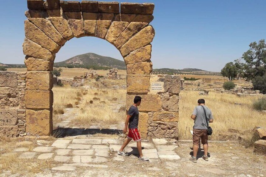 Tourists visiting the Temple of Caelestis - Thuburbo Majus with taximami
