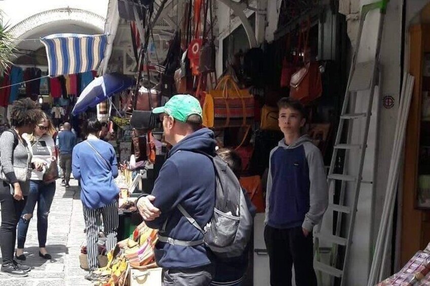 Tourists visiting the bazaars of the Medina of Tunis