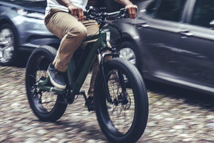 A fat tire electric bike handles the quaint cobblestone streets with ease.