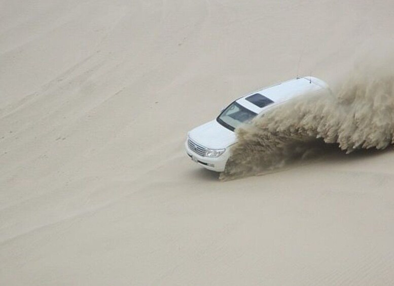 Picture 4 for Activity Doha: Sunrise, Dune Bashing, Camel Ride, & Sand Boarding