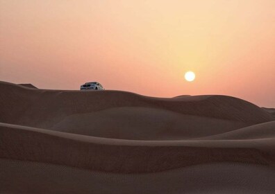 Doha: Solopgang, dune bashing, kamelridning og sandboarding