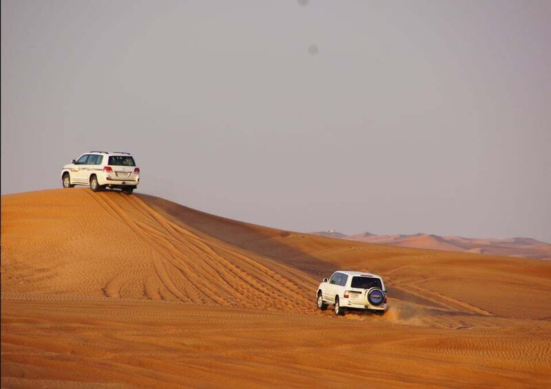 Picture 1 for Activity Sunrise Adventure: Dune Bashing, Camel Ride & Sandboarding