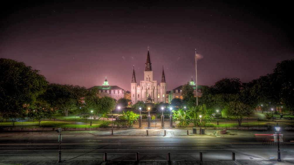 Show item 1 of 5. St. Louis Cathedral at a distance at night in New Orleans