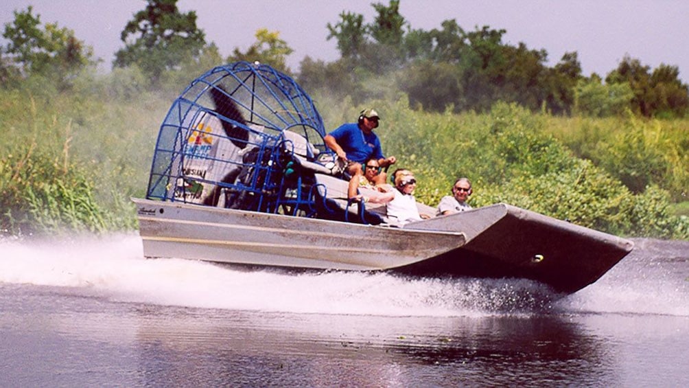 Airboat turning on creek in New Orleans