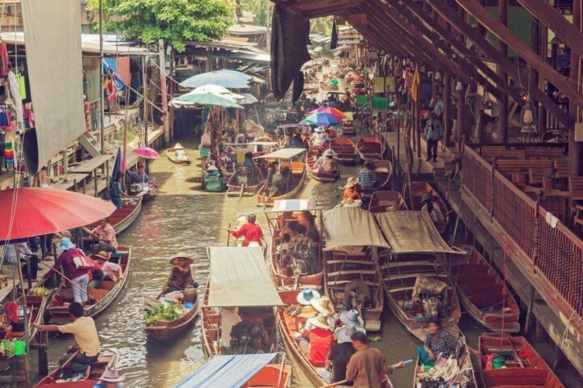 Stroll to the floating and railway market of Samut Song Kram with your own english speaking guide.