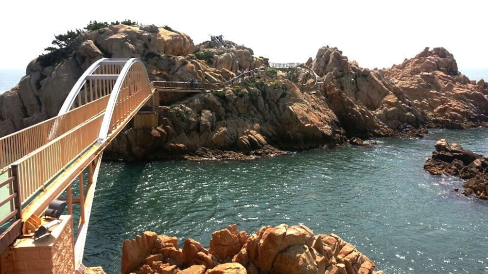 Bridge out to small rocky island of Daewangam park in Ulsan