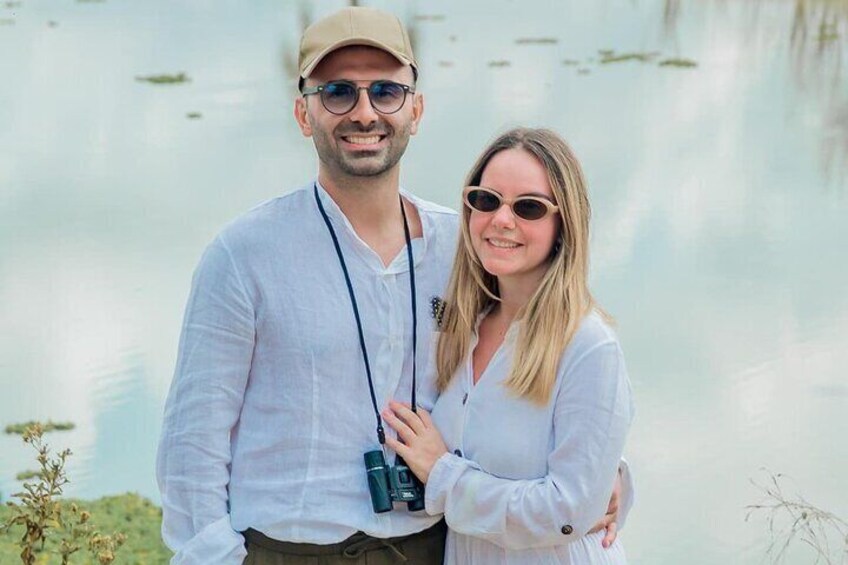 Guests next to hippos pool at Mikumi National Park