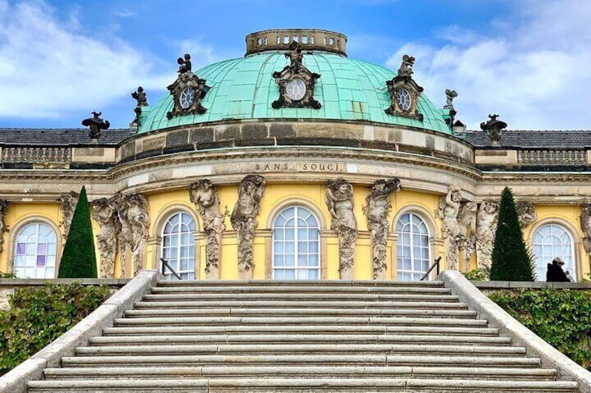 See the magnificent Sanssouci park, palace, and gardens