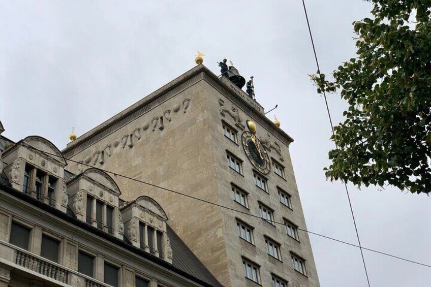 The city's first skyscraper was very controversial. The bell men still reliably strike the time today.