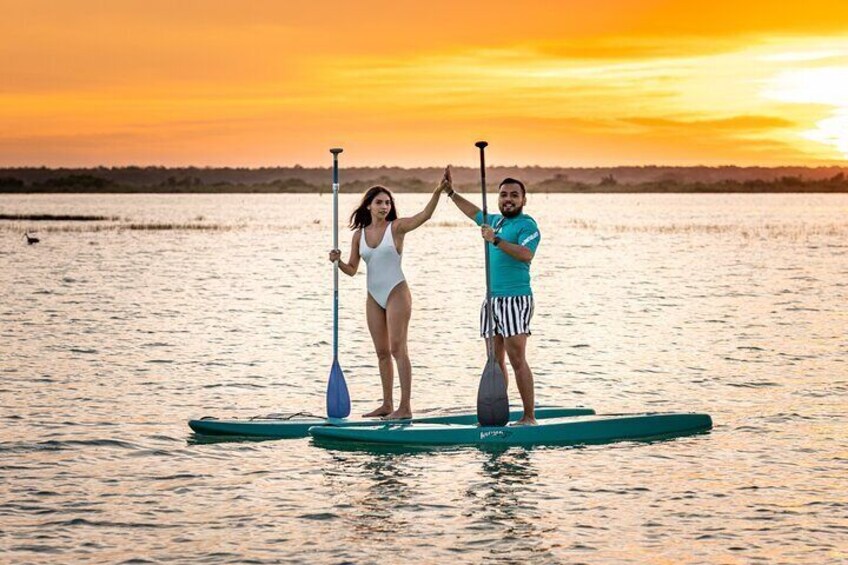 Paddleboard sunrise tour in the seven colors lagoon of Bacalar 