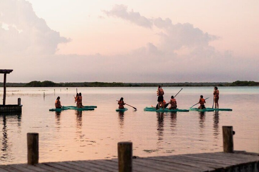 Paddleboard sunrise tour in the seven colors lagoon of Bacalar 