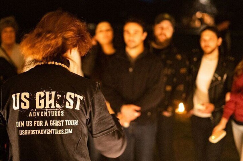 Ghost tour guide telling ghost stories in Newport, Rhode Island on a Haunted Newport Ghosts Tour