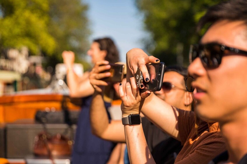 Picture 1 for Activity Amsterdam: 1.5-Hour Canal Cruise with Guide Drinks & Snacks