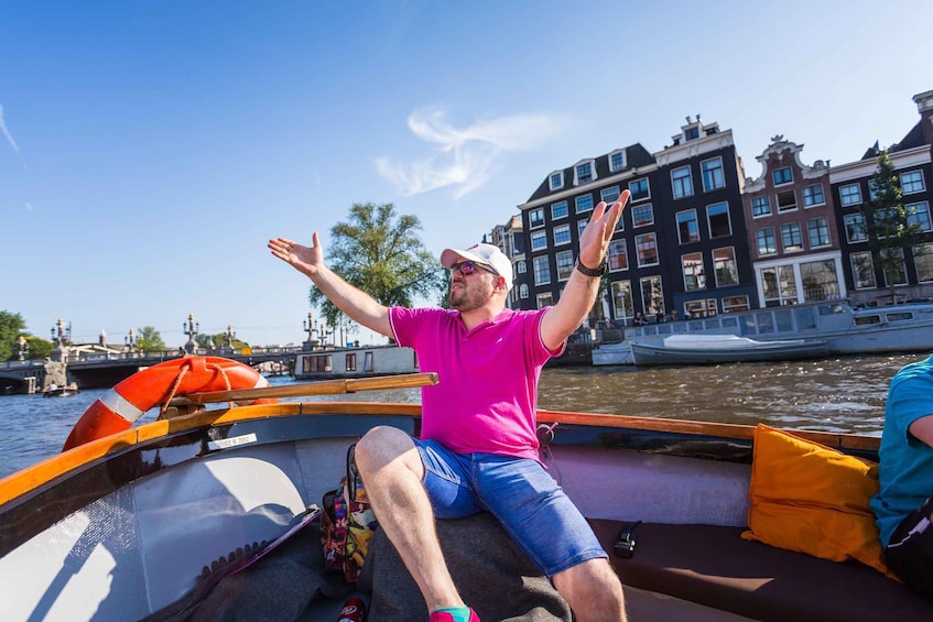 Picture 1 for Activity Amsterdam:1.5-Hour Canal Cruise local Guide, Drinks & Snacks