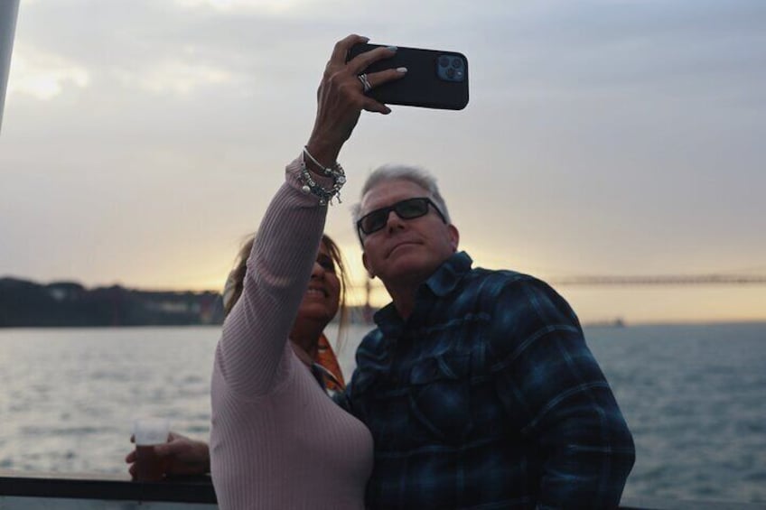 Lisbon: Sunset tour aboard with music & drinks