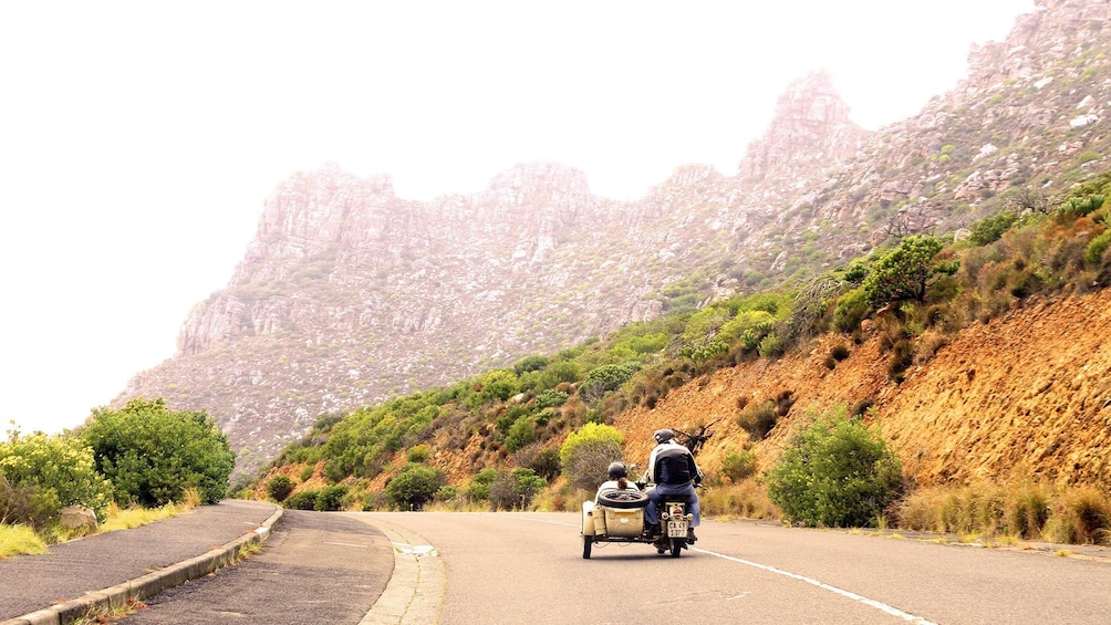Motorcycle and sidecar on road in Cape Town