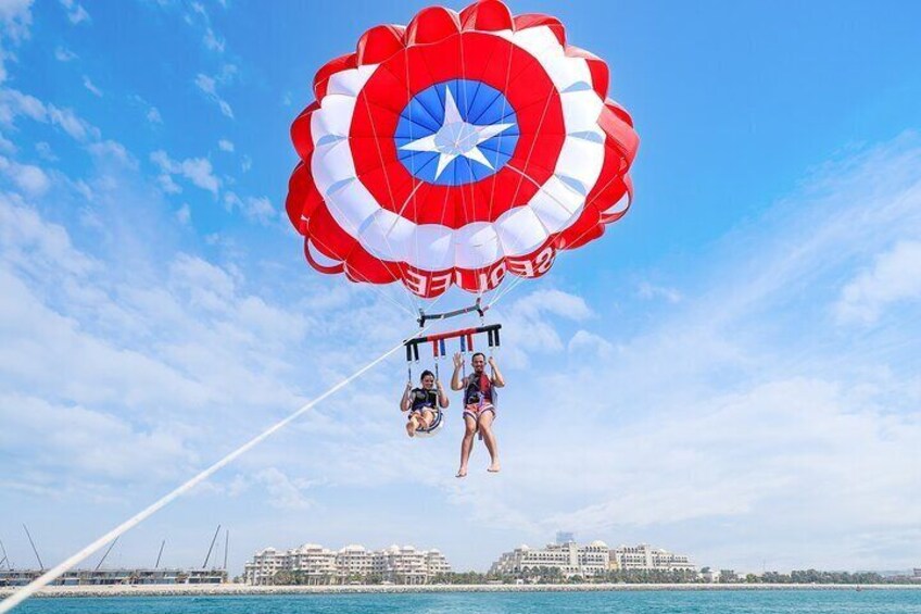 Dubai parasailing With Captain America parachute