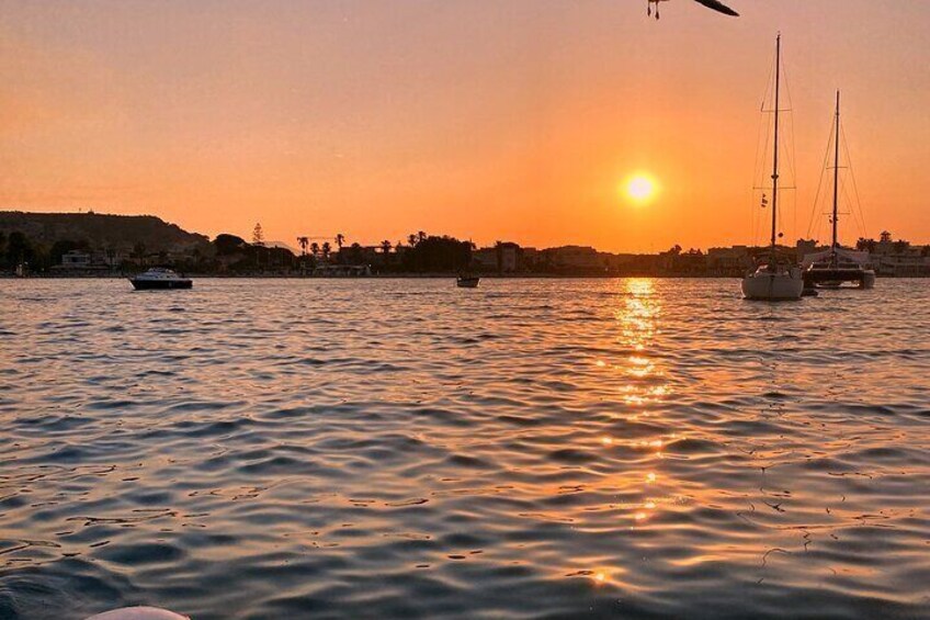 Aperitif with prosecco and focacce at sunset by boat in Cagliari