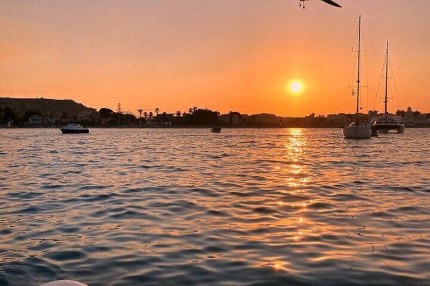 Aperitif with prosecco and focacce at sunset by boat in Cagliari