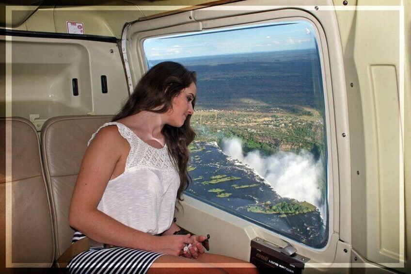 a person sightseeing the falls from the sky