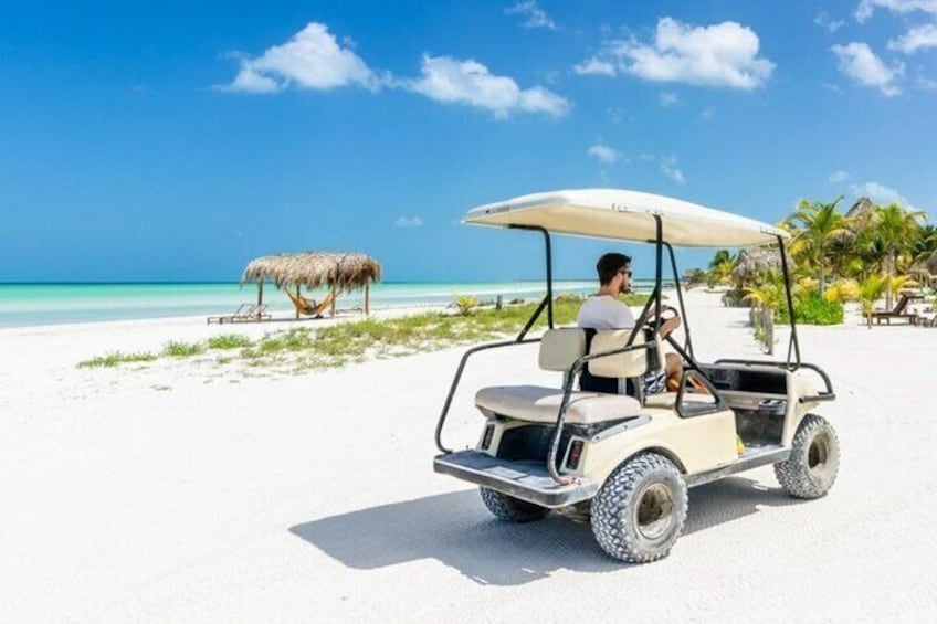 Holbox Island Tour Golf Cart Ferry with Lunch and Transportation