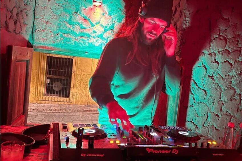 Underground dj spinning Mexican synth rock