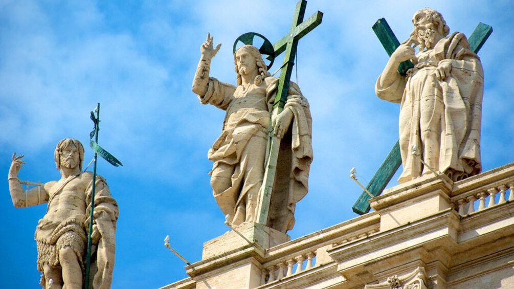 Statues on the ledge in Rome