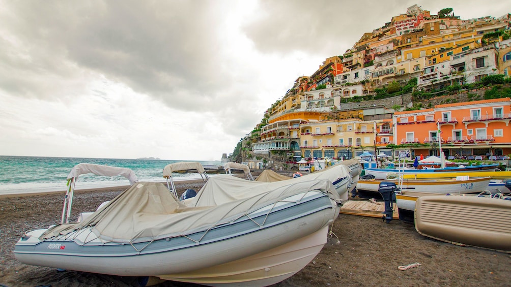 Beach scene with the city in the background on the Amalfi Coast